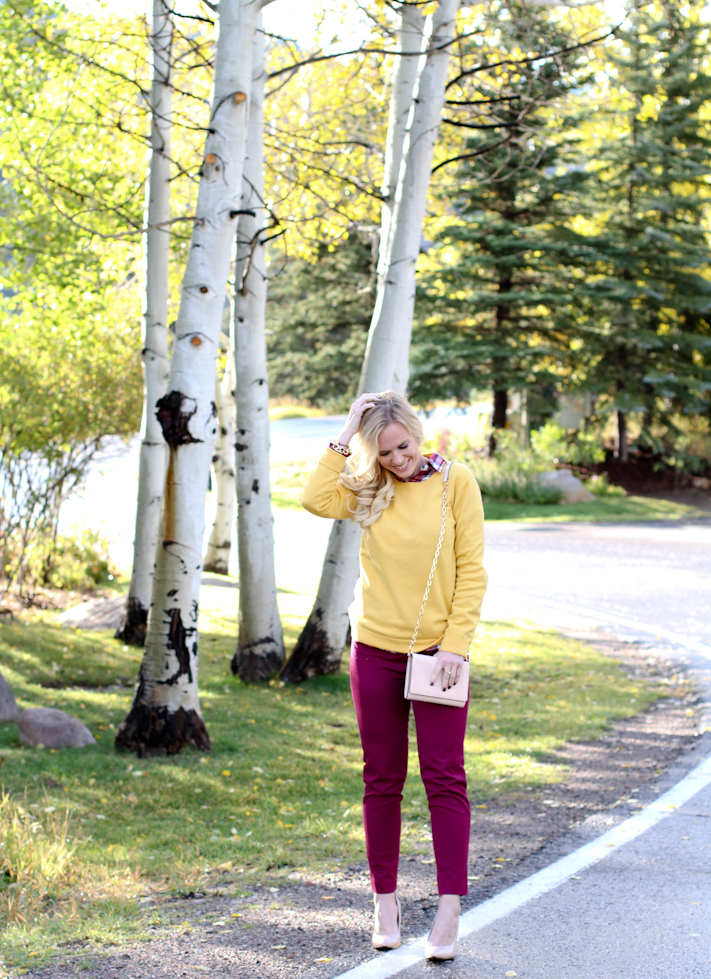 yellow sweater with flannel for fall layers