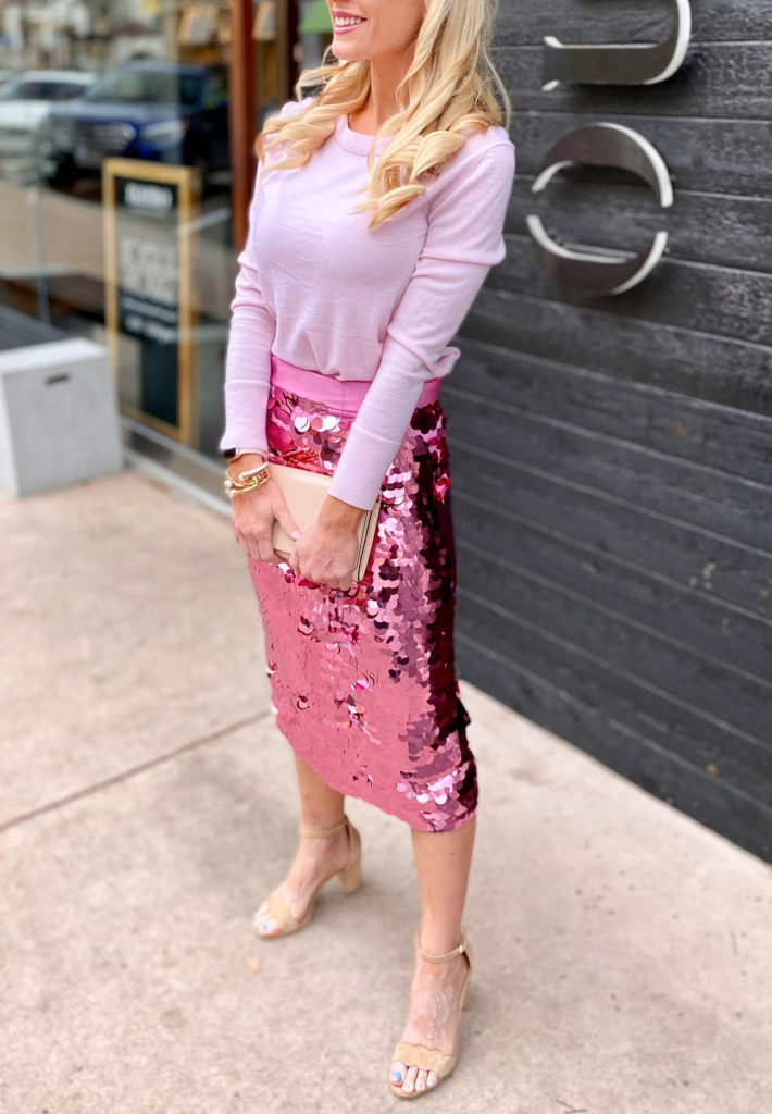 This gorgeous sequin skirt is the statement piece of the season! With the pretty pink color and satin ribbon, get ready to turn heads!  | Pink sequin skirt | Sequin pencil skirt